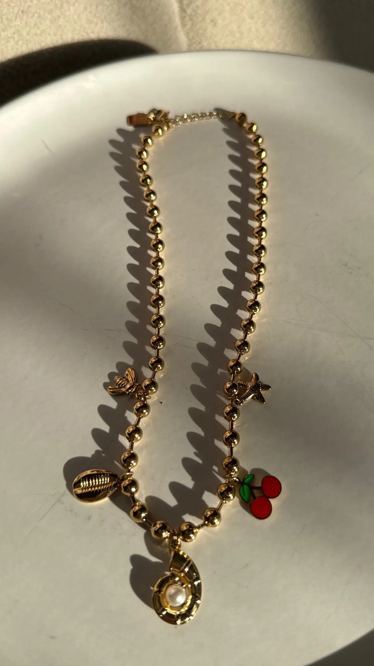 Collier Doré avec charms